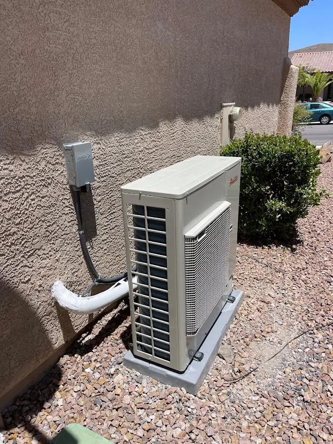 Residential air conditioning condenser unit in Henderson